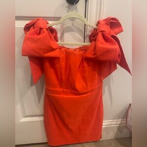 Karlie now dress size L but fits more like a medium